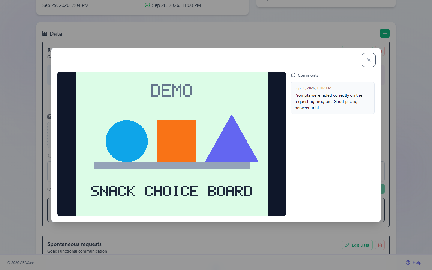 A session photo opened in the web app, with the BCBA's comment under Comments